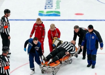 As a KHL official is removed from the ice, a horrifying scenario develops