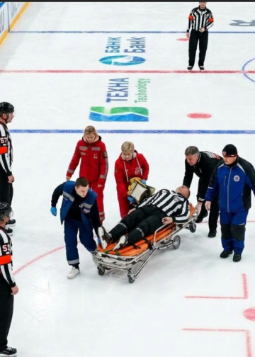 As a KHL official is removed from the ice, a horrifying scenario develops