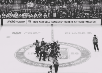 Players clash at center ice after Rangers score, sparking mayhem